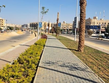 مواصلة أعمال تنفيذ وتطوير الطرق بمناطق مدينة الشيخ زايد